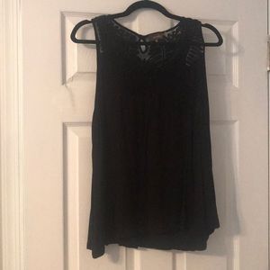 black tank with patterned design at neck line